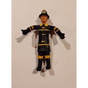 Five (5) inch tall, female firefighter action doll, 1984
